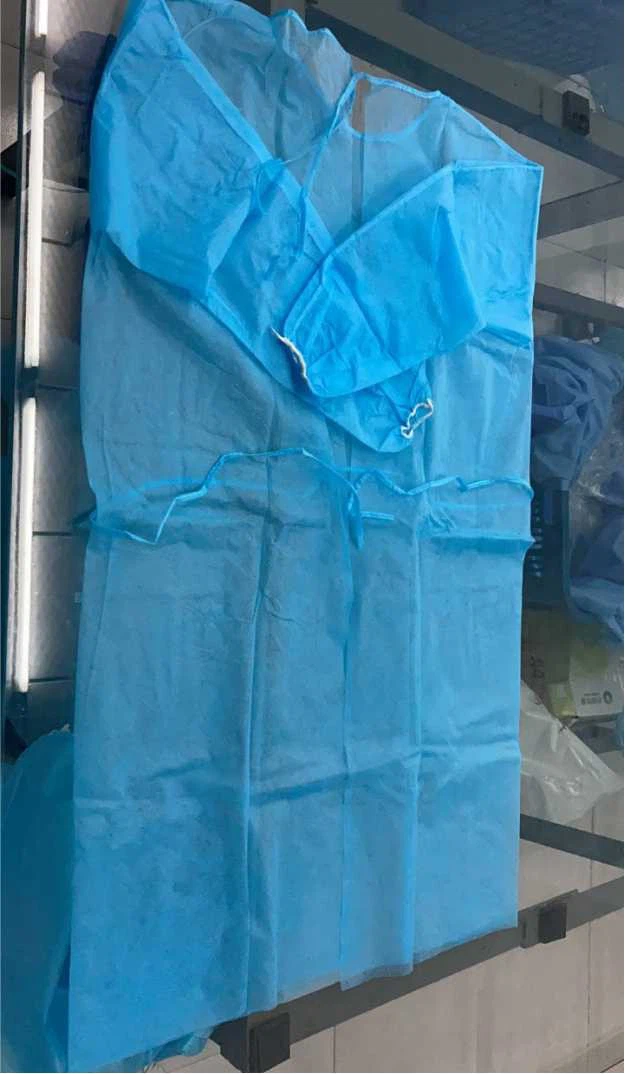 Wasserdichte Ce Nonwoven Einweg-Isolation Soli Kleid